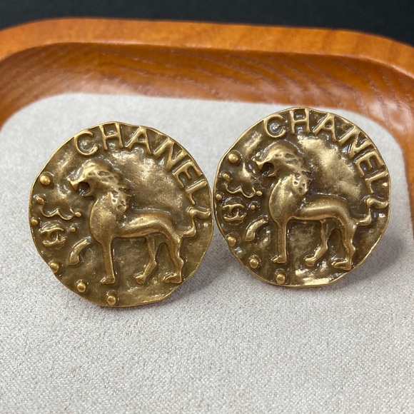 CHANEL Gold Lion Emblem Earrings